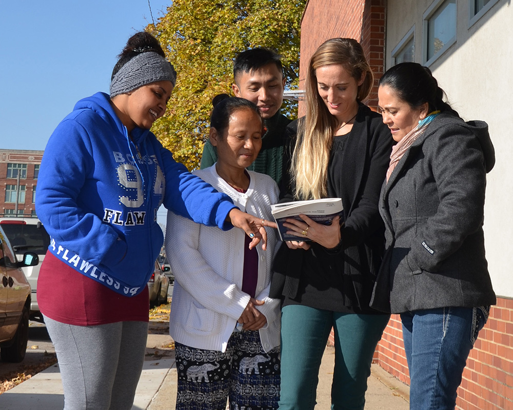 Education & Training Center students working with Mary